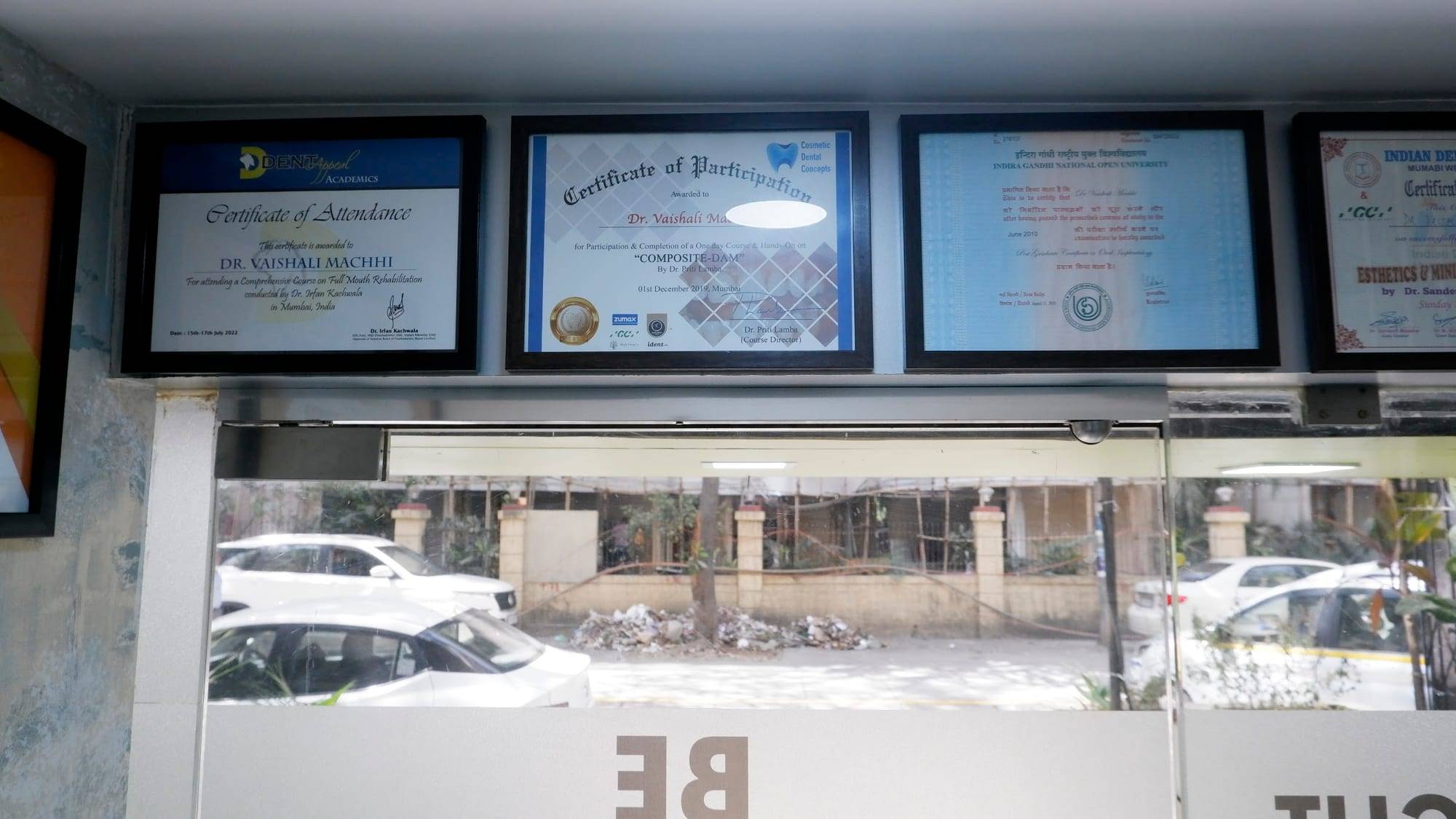 Framed certificates on the clinic wall