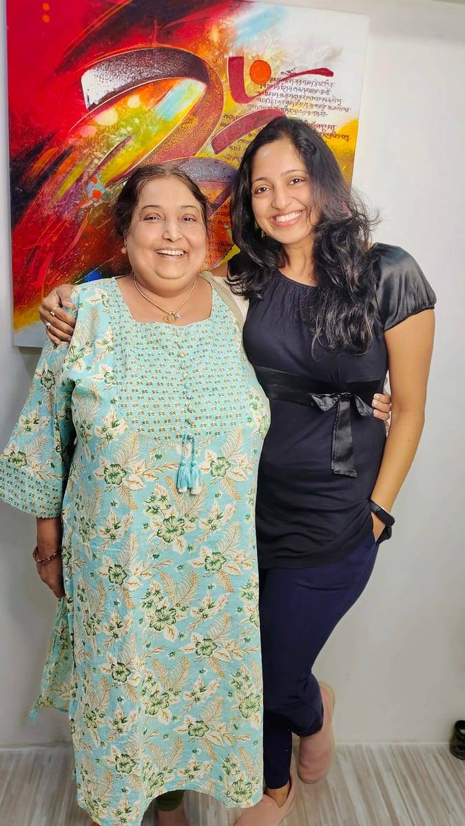 A smiling patient with Dr. Vaishali at Make Me Smile