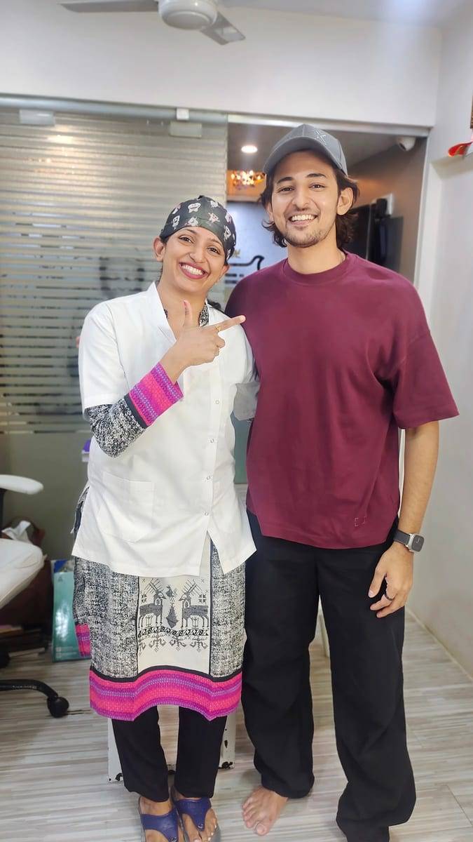 A smiling patient with Dr. Vaishali at Make Me Smile