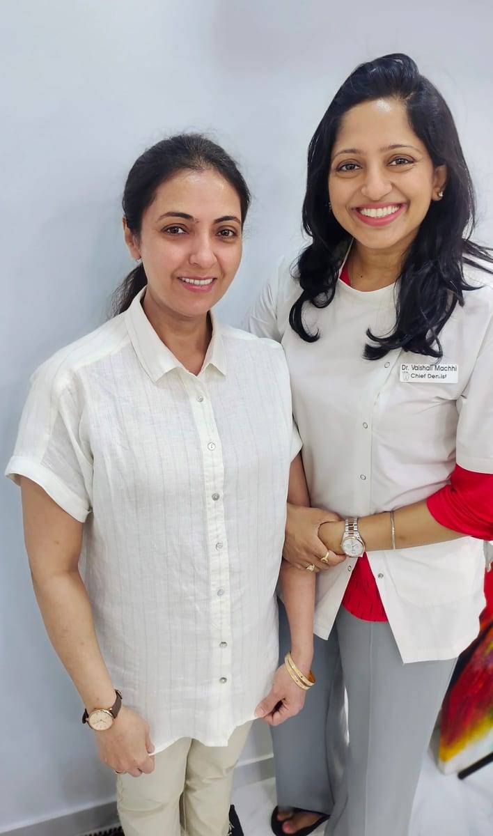 A smiling patient with Dr. Vaishali at Make Me Smile