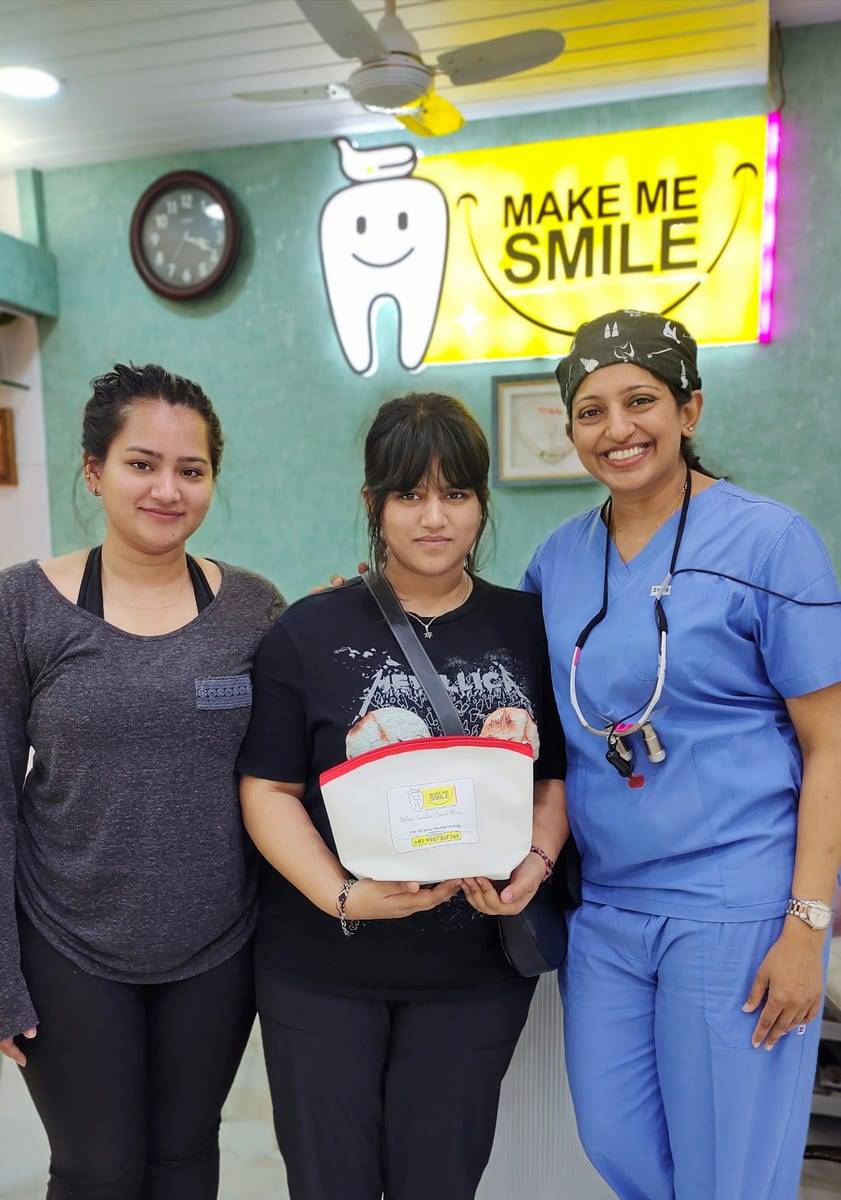 A smiling patient with Dr. Vaishali at Make Me Smile