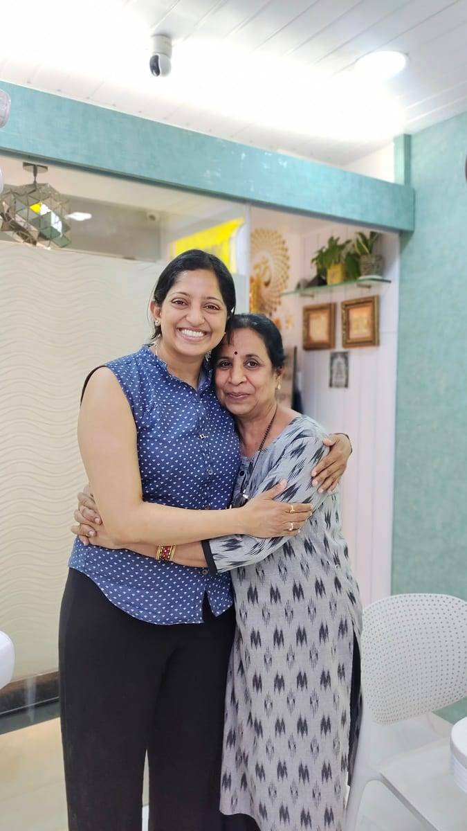 A smiling patient with Dr. Vaishali at Make Me Smile