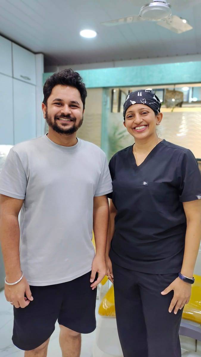 A smiling patient with Dr. Vaishali at Make Me Smile