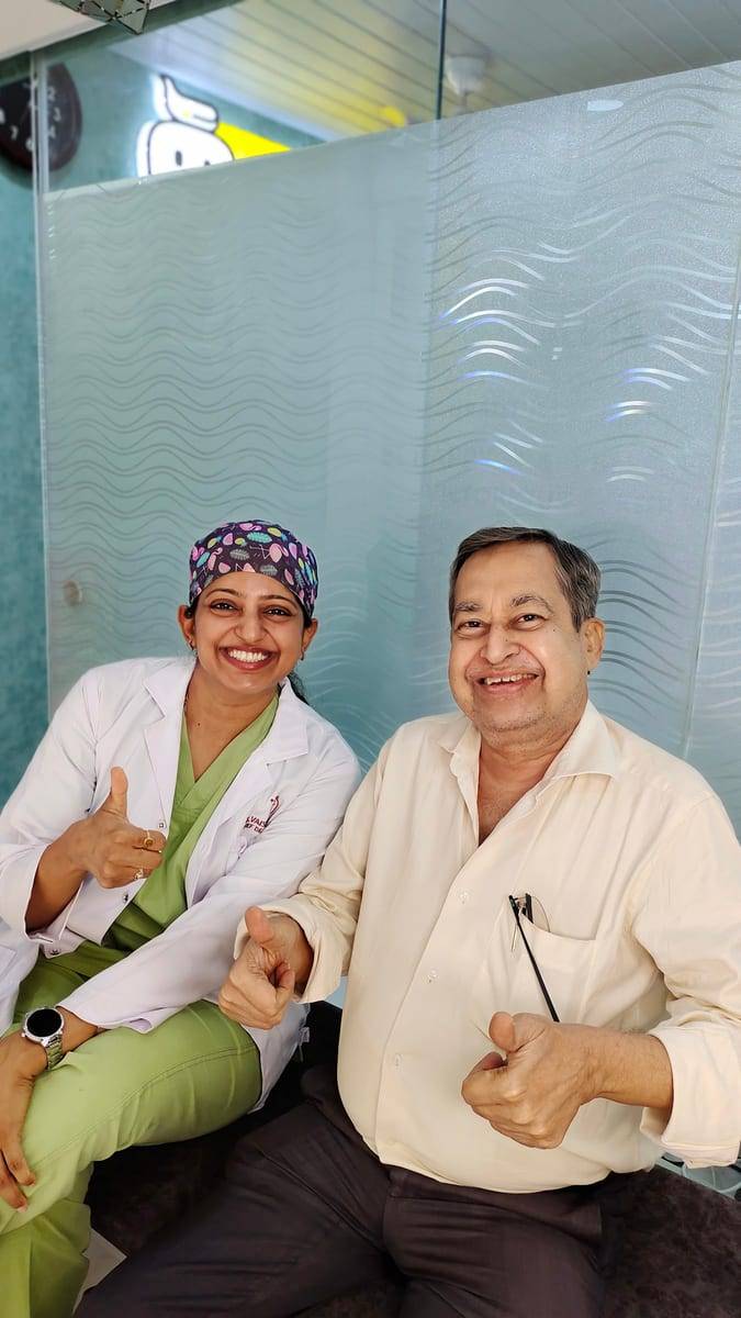 A smiling patient with Dr. Vaishali at Make Me Smile